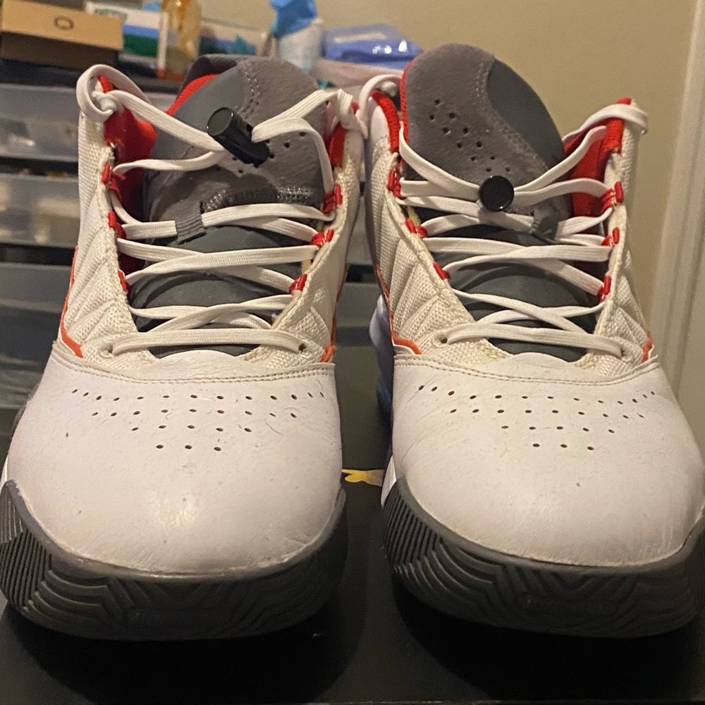 Jordan White and Gray Sneakers with Unique Lacing and Ventilation